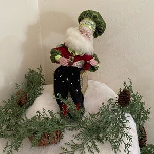 Festive Santa Figurine with Green and Red Outfit